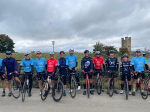 Tour de BT cyclists posing with bikes near Broadway Tower